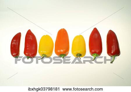 Stock Image - "Red, orange and yellow bell peppers". Fotosearch