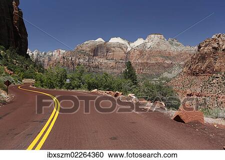 "Red Road in the mountains of Zion National Park, Utah, USA" View Large Photo Image Stock Image - "Red Road in the mountains of Zion National Park, Utah, USA". Fotosearch