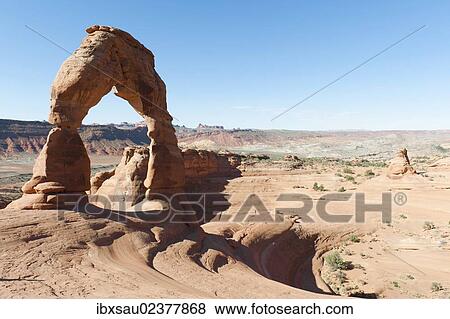 Stock Photo - "Red sandstone, Delicate Arch, a natural stone arch, Arches National Park, Utah, Western United States, United States of America, North America". Fotosearch