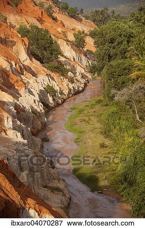 "Red sandstone formations of the canyon on Fairy Stream, Mui Ne, Vietnam, Asia" View Large Photo Image Stock Photo - "Red sandstone formations of the canyon on Fairy Stream, Mui Ne, Vietnam, Asia". Fotosearch