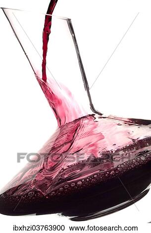 Red wine is being poured into decanter View Large Photo Image Stock Image - Red wine is being poured into decanter. Fotosearch
