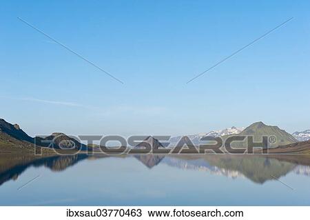 "Reflection in the still lake, panoramic mountain landscape at Alftavatn lake, Laugavegur trekking route, Highlands, Suourland, Iceland, Europe" View Large Photo Image Stock Image - "Reflection in the still lake, panoramic mountain landscape at Alftavatn lake, Laugavegur trekking route, Highlands, Suourland, Iceland, Europe". Fotosearch