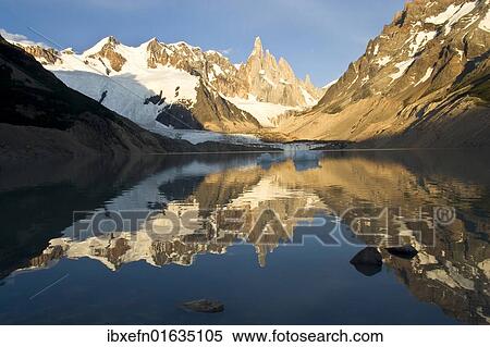 Stock Photography - "Reflection of Mt Cerro Torre in a glacial lake in the morning, Parque Nacional Los Glaciares, Los Glaciares National Park, Patagonia, Argentina, South America". Fotosearch