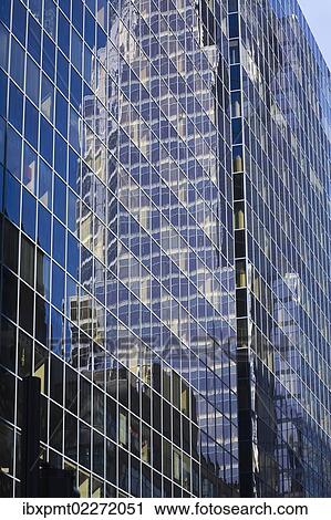 "Reflections in a modern glass and steel office tower building, Montreal, Quebec, Canada, North America" View Large Photo Image Stock Image - "Reflections in a modern glass and steel office tower building, Montreal, Quebec, Canada, North America". Fotosearch