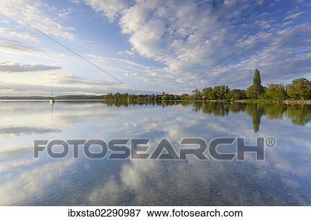 "Reflections on the shore of Lake Constance near Reichenau Island, Baden-Wuerttemberg, Germany, Europe" View Large Photo Image Stock Photo - "Reflections on the shore of Lake Constance near Reichenau Island, Baden-Wuerttemberg, Germany, Europe". Fotosearch
