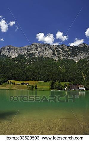 Stock Image - "Reiter Alps, the shimmering green Lake Hintersee at the front, Ramsau bei Berchtesgaden, Berchtesgadener Land District, Upper Bavaria, Bavaria, Germany, Europe". Fotosearch