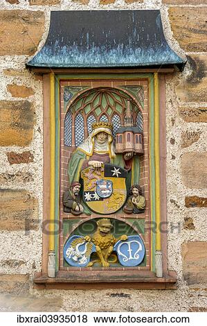 "Relief, image of St Elizabeth above the entrance to the Renaissance Tower of the historic Town Hall, market square, historic centre, Marburg, Hesse, Germany, Europe" View Large Photo Image Stock Photo - "Relief, image of St Elizabeth above the entrance to the Renaissance Tower of the historic Town Hall, market square, historic centre, Marburg, Hesse, Germany, Europe". Fotosearch