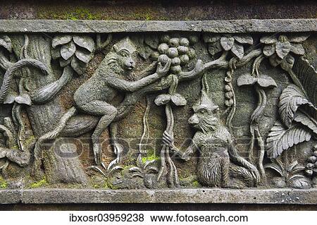 "Relief with macaques at Monkey Forest temple, Pura Dalem Agung Padangtegal temple in the Ubud Monkey Forest, Ubud, Bali, Indonesia, Asia" View Large Photo Image Stock Photo - "Relief with macaques at Monkey Forest temple, Pura Dalem Agung Padangtegal temple in the Ubud Monkey Forest, Ubud, Bali, Indonesia, Asia". Fotosearch