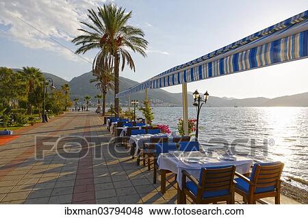 "Restaurant at the promenade, Fethiye, Mugla Province, Lycian Coast, Aegean, Turkey, Asia" View Large Photo Image Stock Photo - "Restaurant at the promenade, Fethiye, Mugla Province, Lycian Coast, Aegean, Turkey, Asia". Fotosearch