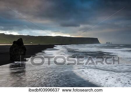 "Reynisdrangar rock formation, dramatic clouds, black sand beach, near Vik i Myrdal, South Coast, Suourland, Iceland, Europe" View Large Photo Image Stock Photo - "Reynisdrangar rock formation, dramatic clouds, black sand beach, near Vik i Myrdal, South Coast, Suourland, Iceland, Europe". Fotosearch