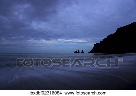 Picture - "Reynisdrangar rock formation near Vik i Myrdal, black sandy beach, southern coast, Iceland, Europe". Fotosearch