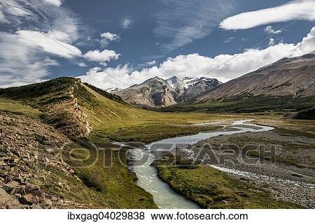 Stock Photo - "River in a valley, Sierra de las Vacas, Patagonia, Argentina, South America". Fotosearch