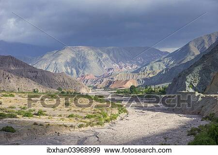 "Riverbed of the Purmamarca and Cerro de los Siete Colores or Hill of Seven Colors in Purmamarca, Jujuy Province, Argentina, South America" View Large Photo Image Stock Photo - "Riverbed of the Purmamarca and Cerro de los Siete Colores or Hill of Seven Colors in Purmamarca, Jujuy Province, Argentina, South America". Fotosearch