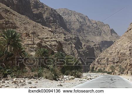 Stock Photograph - "Road in the Wadi Shab mountain ravine, Hadjar-Gebirge, Hadschar-Gebirge, Tiwi, Oman, Asia". Fotosearch