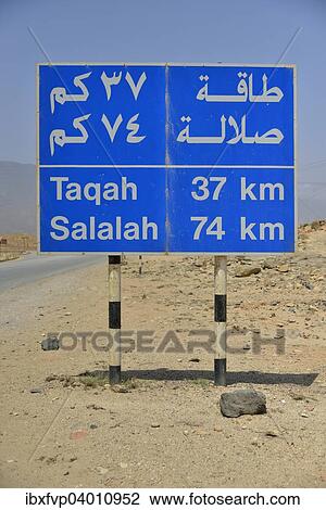 "Road sign with kilometre indications, near Mirbat, Dhofar Region, Orient, Oman, Asia" View Large Photo Image Stock Image - "Road sign with kilometre indications, near Mirbat, Dhofar Region, Orient, Oman, Asia". Fotosearch