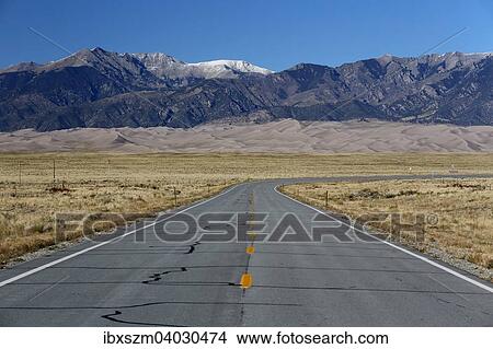 "Road to the Great Sand Dunes National Park and Preserve, Sangre de Cristo Mountains at the back, Colorado, United States, North America" View Large Photo Image Picture - "Road to the Great Sand Dunes National Park and Preserve, Sangre de Cristo Mountains at the back, Colorado, United States, North America". Fotosearch