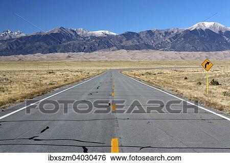 "Road to the Great Sand Dunes National Park and Preserve, Sangre de Cristo Mountains at the back, Colorado, United States, North America" View Large Photo Image Stock Photograph - "Road to the Great Sand Dunes National Park and Preserve, Sangre de Cristo Mountains at the back, Colorado, United States, North America". Fotosearch