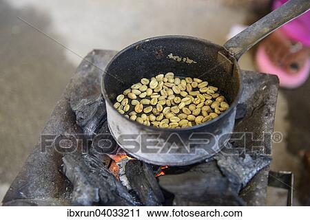 "Roasting coffee beans, Keren, Eritrea, Africa" View Large Photo Image Stock Image - "Roasting coffee beans, Keren, Eritrea, Africa". Fotosearch