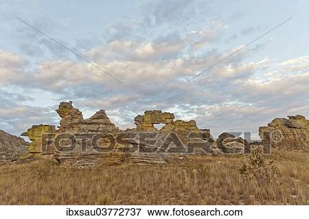 "Rock formation La Fenetre d'Isalo at dusk, Isalo National Park, at Ranohira, Madagascar, Africa" View Large Photo Image Stock Photo - "Rock formation La Fenetre d'Isalo at dusk, Isalo National Park, at Ranohira, Madagascar, Africa". Fotosearch