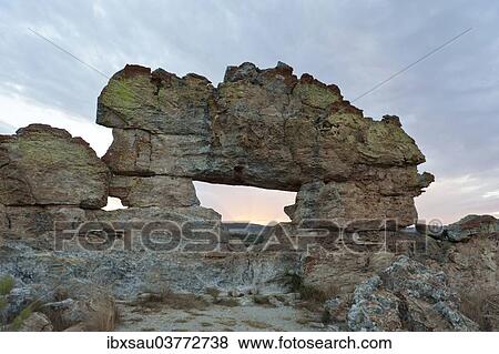 "Rock formation La Fenetre d'Isalo at dusk, Isalo National Park, at Ranohira, Madagascar, Africa" View Large Photo Image Stock Photo - "Rock formation La Fenetre d'Isalo at dusk, Isalo National Park, at Ranohira, Madagascar, Africa". Fotosearch