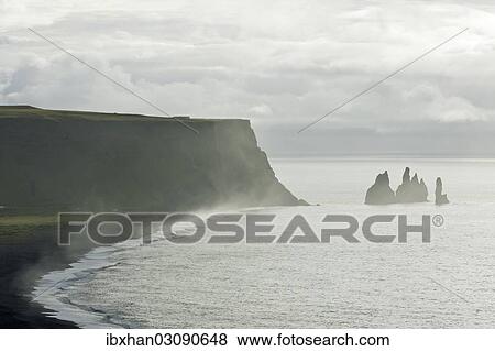 "Rock formations of Reynisdrangar and Reynisfjall Mountain, Dyrholaey, Vik i Myrdal, Southern Region, Iceland, Europe" View Large Photo Image Stock Photo - "Rock formations of Reynisdrangar and Reynisfjall Mountain, Dyrholaey, Vik i Myrdal, Southern Region, Iceland, Europe". Fotosearch