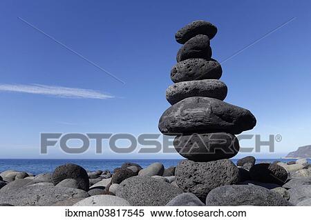 Stock Photography - "Rock heap of lava pebbles, Playa de Los Guirres in Puerto Naos, La Palma, Canary Islands, Spain, Europe". Fotosearch