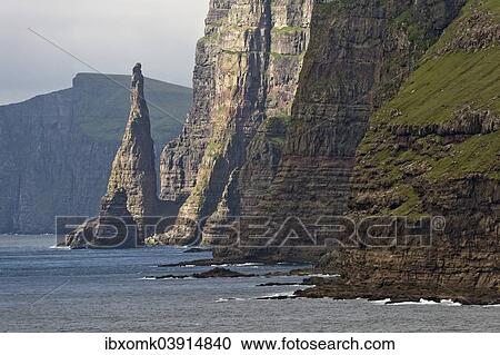 "Rock pinnacle and cliff, west coast of Sandoy, Faroe Islands, Denmark, Europe" View Large Photo Image Stock Image - "Rock pinnacle and cliff, west coast of Sandoy, Faroe Islands, Denmark, Europe". Fotosearch