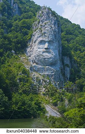"Rock sculpture of Decebalus, Parcul Natural Por? ¢ile de Fier or Iron Gates Natural Park, Danube Valley, Romania, Europe" View Large Photo Image Stock Photo - "Rock sculpture of Decebalus, Parcul Natural Por? ¢ile de Fier or Iron Gates Natural Park, Danube Valley, Romania, Europe". Fotosearch