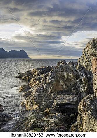 "Rock structures on the coast near Husoy, Senja Island, Troms, Norway, Europe" View Large Photo Image Stock Image - "Rock structures on the coast near Husoy, Senja Island, Troms, Norway, Europe". Fotosearch
