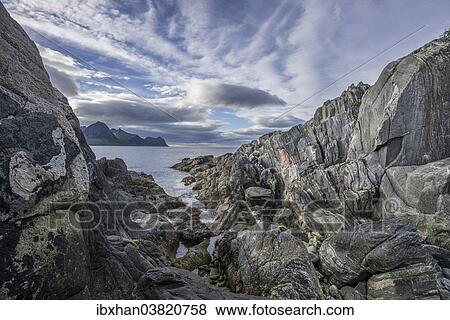 "Rock structures on the coast near Husoy, Senja Island, Troms, Norway, Europe" View Large Photo Image Stock Photo - "Rock structures on the coast near Husoy, Senja Island, Troms, Norway, Europe". Fotosearch