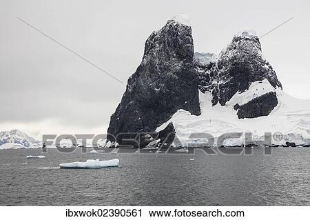 "Rocks in the Lemaire Channel, Una's Tits, Graham Land, Antarctic Peninsula, Antarctica" View Large Photo Image Stock Image - "Rocks in the Lemaire Channel, Una's Tits, Graham Land, Antarctic Peninsula, Antarctica". Fotosearch