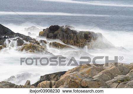 Stock Image - "Rocks in the sea, Laukvik, Lofoten, Norway, Europe". Fotosearch