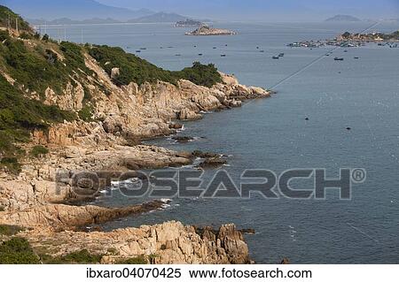 "Rocky cliffs on the Chinese sea, at Phan Rang, Ninh Thuan, Vietnam, Asia" View Large Photo Image Stock Photography - "Rocky cliffs on the Chinese sea, at Phan Rang, Ninh Thuan, Vietnam, Asia". Fotosearch