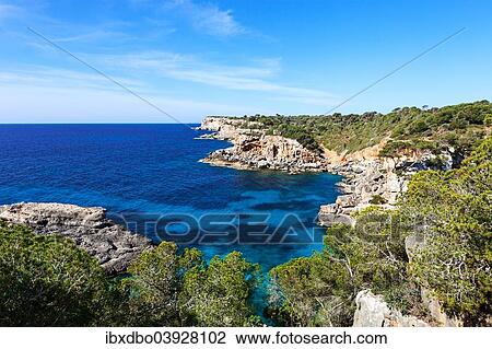 "Rocky coast between Cala de s'Almonia and Cap de Salines, Cap des Moro, Santanyi, Majorca, Balearic Islands, Spain, Europe" View Large Photo Image Stock Image - "Rocky coast between Cala de s'Almonia and Cap de Salines, Cap des Moro, Santanyi, Majorca, Balearic Islands, Spain, Europe". Fotosearch