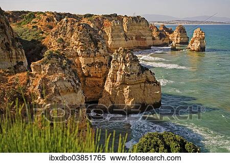 "Rocky coast of Praia de Dona Ana, Lagos, Algarve, Portugal, Europe" View Large Photo Image Stock Photography - "Rocky coast of Praia de Dona Ana, Lagos, Algarve, Portugal, Europe". Fotosearch
