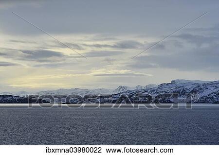 "Rocky island landscape at the north sea with cloudy sky, Soroysund, Finnmark County, Norway, Europe" View Large Photo Image Stock Image - "Rocky island landscape at the north sea with cloudy sky, Soroysund, Finnmark County, Norway, Europe". Fotosearch