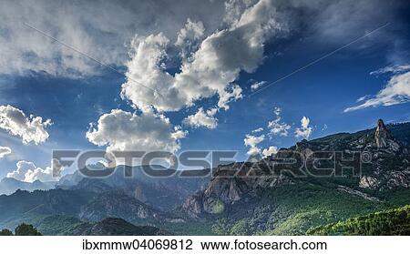 "Rocky landscape with cloudy sky, Bavella, Bavella Massif, Corsica, France, Europe" View Large Photo Image Stock Image - "Rocky landscape with cloudy sky, Bavella, Bavella Massif, Corsica, France, Europe". Fotosearch