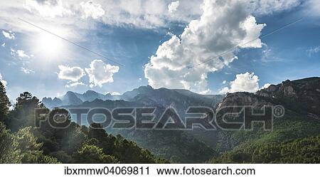 "Rocky landscape with pines and cloudy sky, Bavella, Bavella Massif, Corsica, France, Europe" View Large Photo Image Stock Image - "Rocky landscape with pines and cloudy sky, Bavella, Bavella Massif, Corsica, France, Europe". Fotosearch