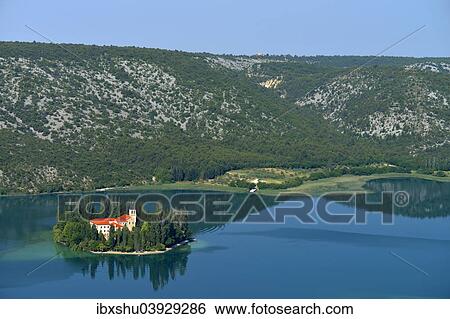 Stock Photograph - "Roman Catholic Franciscan monastery Visovac, Krka National Park, Sibenik-Knin, Dalmatia, Croatia, Europe". Fotosearch