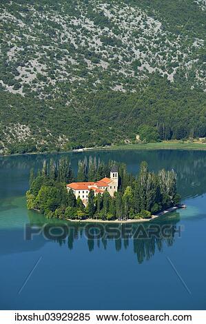 Stock Photography - "Roman Catholic Franciscan monastery Visovac, Krka National Park, Sibenik-Knin, Dalmatia, Croatia, Europe". Fotosearch