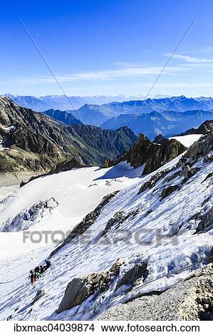 "Rope team during the ascent of the northwestern ridge to Mt Grande Lui, Mont Blanc Massif, Alps, Canton of Valais, Switzerland, Europe" View Large Photo Image Picture - "Rope team during the ascent of the northwestern ridge to Mt Grande Lui, Mont Blanc Massif, Alps, Canton of Valais, Switzerland, Europe". Fotosearch