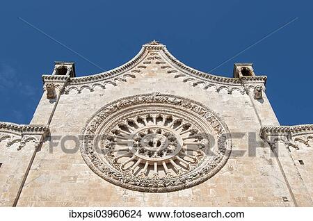 Picture - "Rose window, Ostuni Cathedral, Cattedrale di Santa Maria Assunta, Ostuni, Apulia, Italy, Europe". Fotosearch