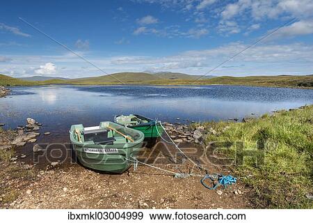 "Row boats on the shores of Loch Meadi, Altnaharra, Northern Highlands, Scotland, United Kingdom, Europe" View Large Photo Image Stock Photo - "Row boats on the shores of Loch Meadi, Altnaharra, Northern Highlands, Scotland, United Kingdom, Europe". Fotosearch
