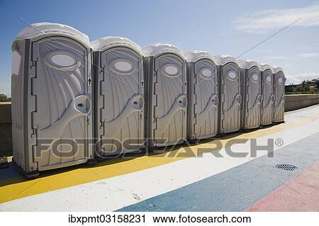 "Row of portable toilets outdoors, Montreal, Quebec Province, Canada, North America" View Large Photo Image Stock Image - "Row of portable toilets outdoors, Montreal, Quebec Province, Canada, North America". Fotosearch