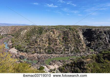 Stock Image - "Ruacana Falls during the dry season, Omusati Region, Namibia, Africa". Fotosearch