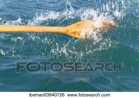 Stock Photograph - "Rudder of a rowing boat in the water, Fuschlsee lake, Salzkammergut, Salzburg State, Austria, Europe". Fotosearch