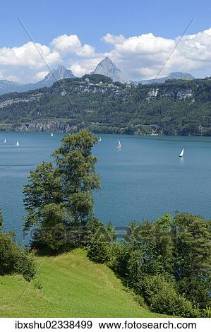 Stock Photo - "Ruetli, the founding site of Switzerland, with the Kleiner Mythen and Grosser Mythen mountains, Brunnen, Switzerland, Europe". Fotosearch