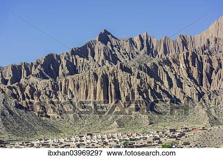Stock Photo - "Rugged mountain and a planned settlement, social housing, Tilcara, Jujuy Province, Argentina, South America". Fotosearch