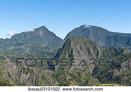 "Rugged mountain landscape, view over La Roche Ecrite, Cirque de Salazie, Hell-Bourg, Reunion" View Large Photo Image Stock Image - "Rugged mountain landscape, view over La Roche Ecrite, Cirque de Salazie, Hell-Bourg, Reunion". Fotosearch