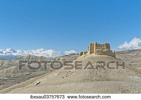 "Ruins of the Ketcher Dzong fortress, the Annapurna Range at back, near Lo Manthang, Upper Mustang, Lo, Nepal, Asia" View Large Photo Image Stock Image - "Ruins of the Ketcher Dzong fortress, the Annapurna Range at back, near Lo Manthang, Upper Mustang, Lo, Nepal, Asia". Fotosearch